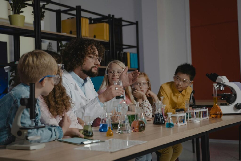 Scientist doing science experiments with children