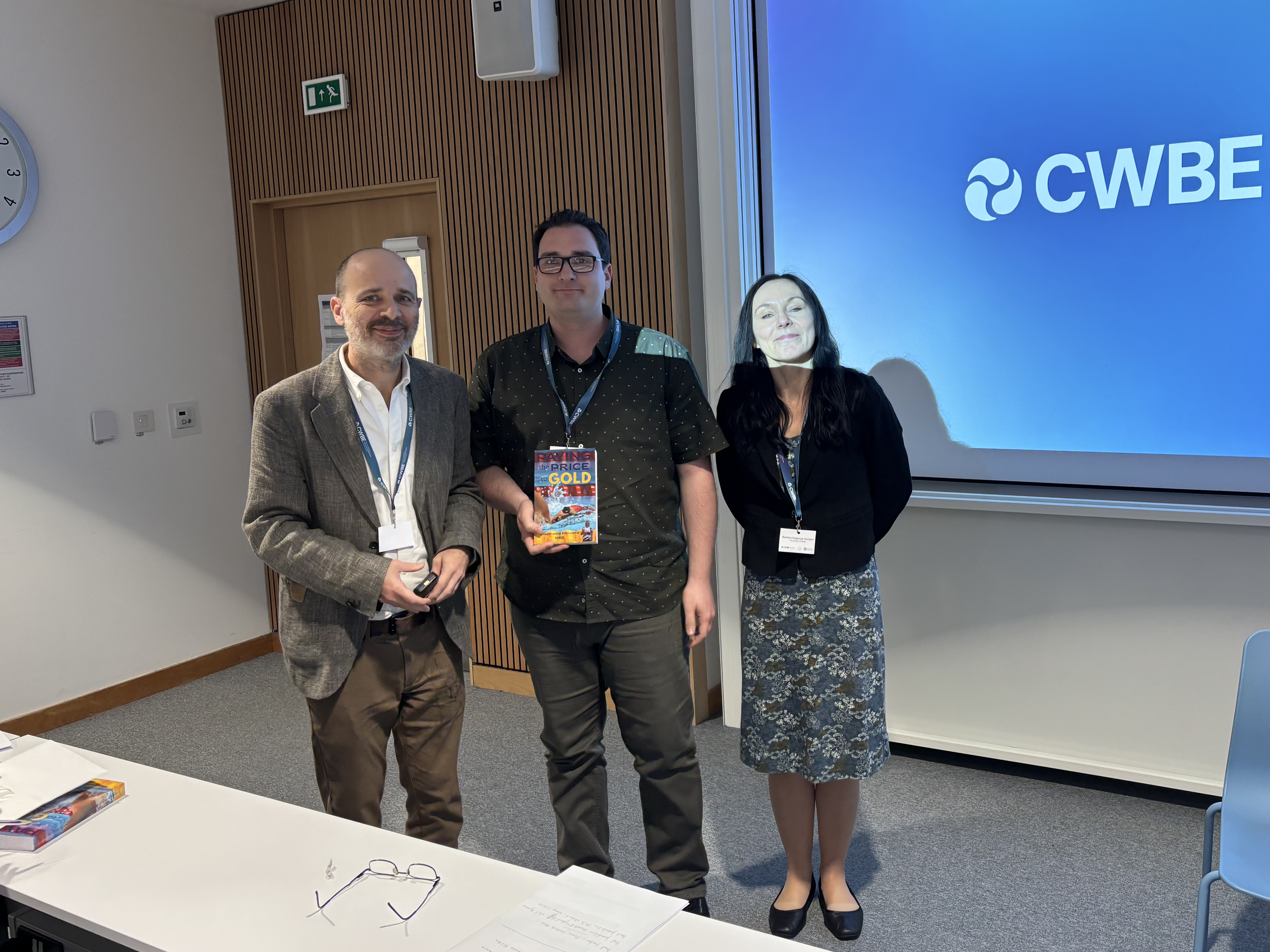 Dr. Neil A. Byrnes winning an award for the Best Post-Doctoral Research Associate Presentation with Prof. Pedro Estrela and Prof. Barbara Kasprzyk-Hordern